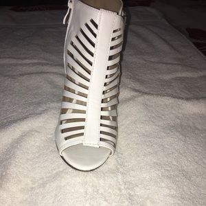 White summer sandals with a small heel